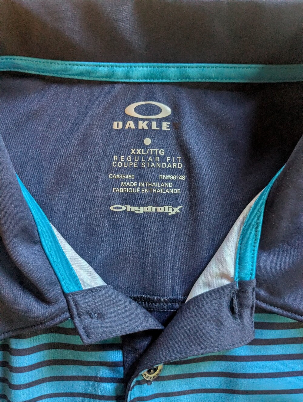 Oakley Navy Polo with Teal Accents